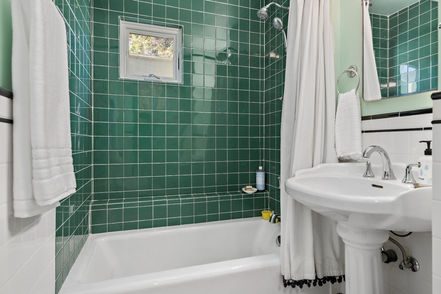 21195 Bertram Road San Jose, CA 95120 - Photo 11 of 20 a bathroom with a sink mirror toilet and bathtub
