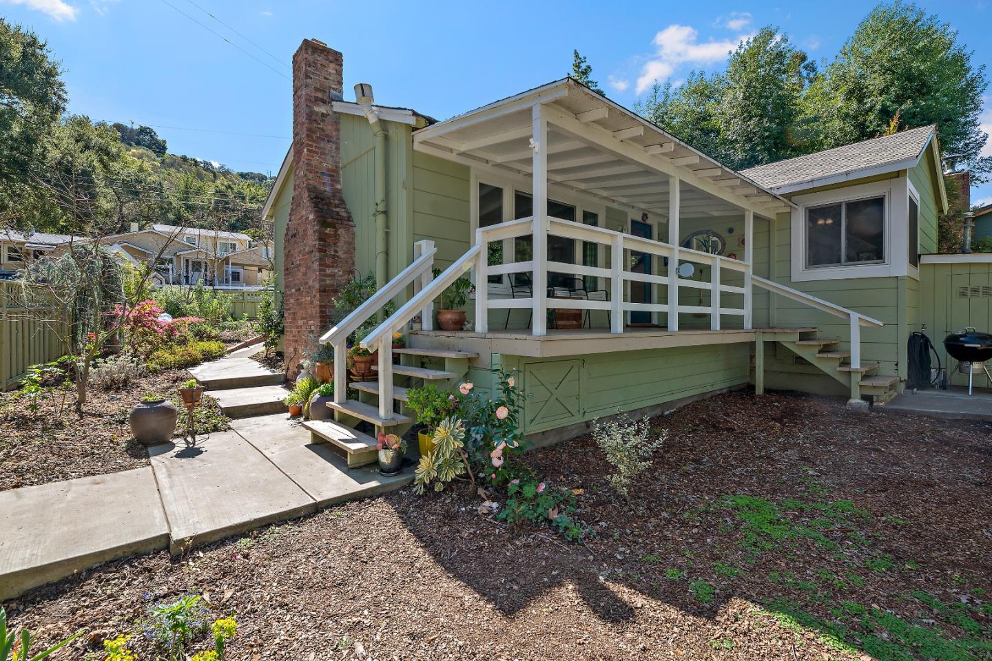 21195 Bertram Road San Jose, CA 95120 - Photo 13 of 20 a view of a house with a yard and wooden fence