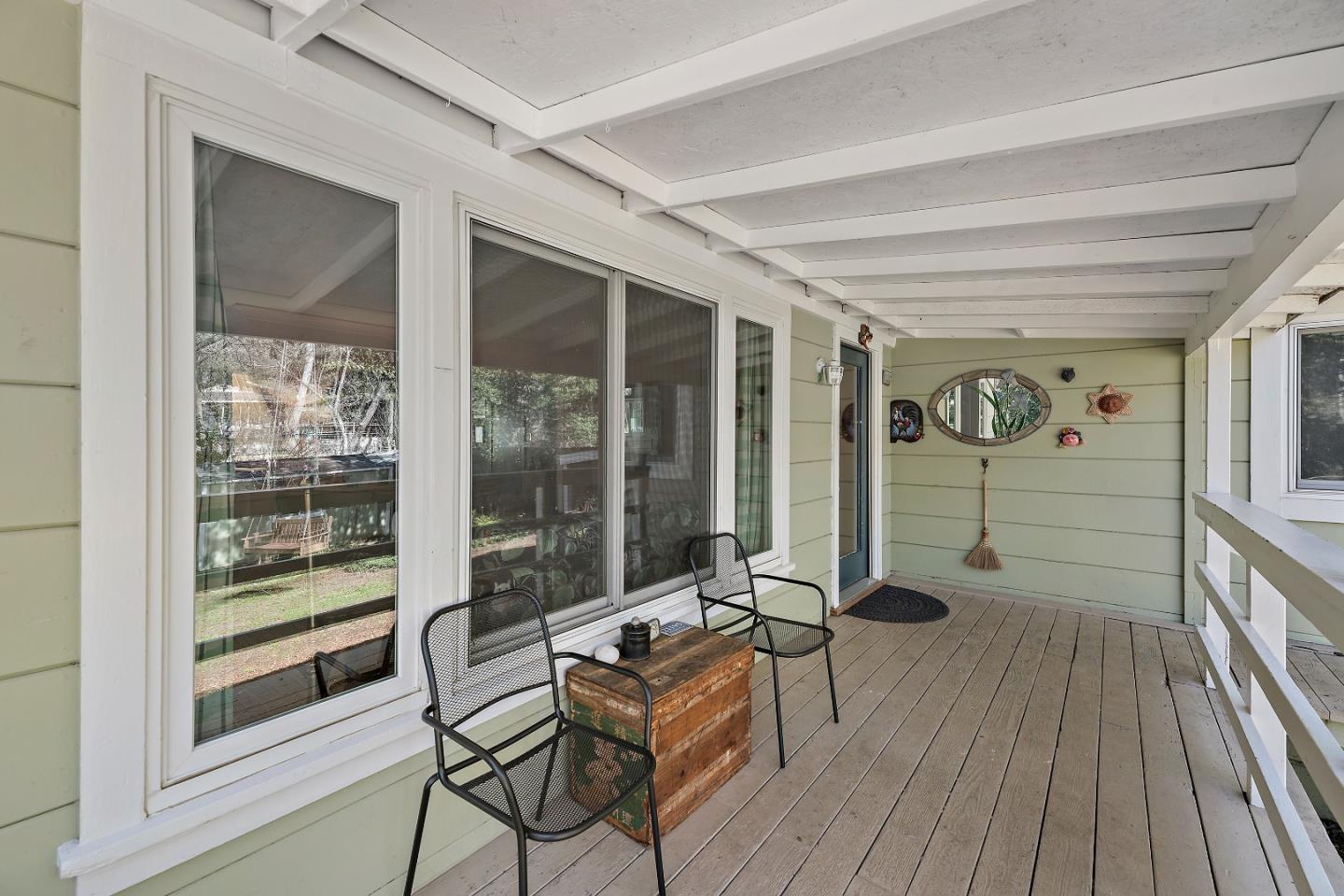 21195 Bertram Road San Jose, CA 95120 - Photo 14 of 20 a living room with furniture a wooden floor and next to window