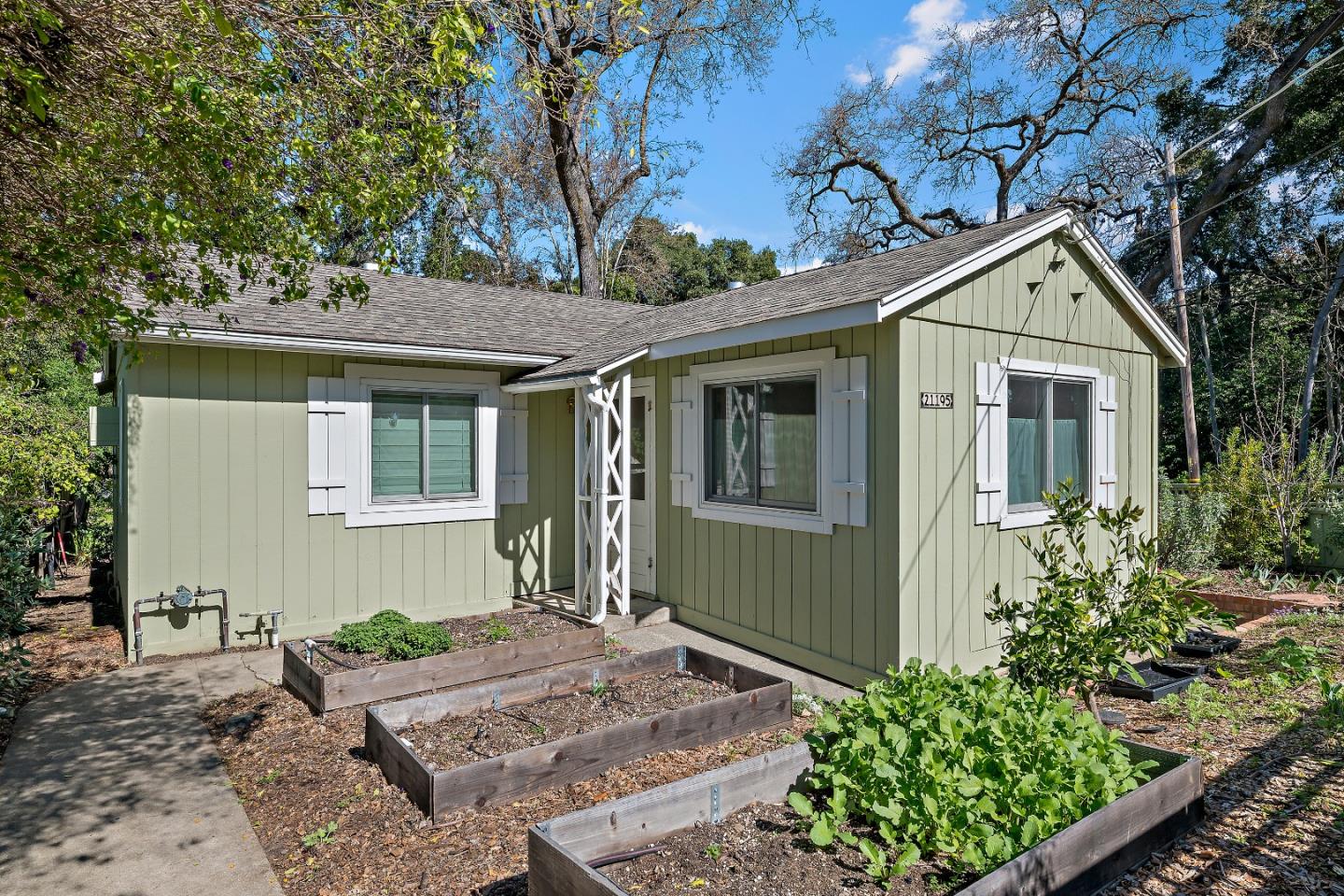 21195 Bertram Road San Jose, CA 95120 - Photo 16 of 20 a front view of a house with garden