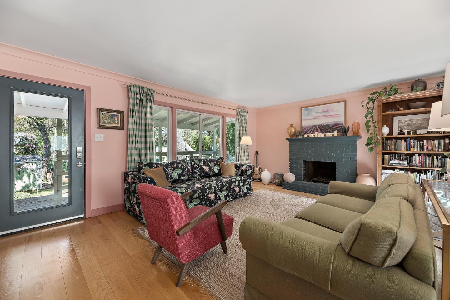21195 Bertram Road San Jose, CA 95120 - Photo 7 of 20 a living room with furniture large window and a fireplace