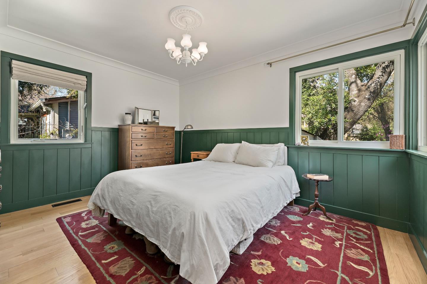 21195 Bertram Road San Jose, CA 95120 - Photo 10 of 20 a bedroom with a large bed and a window