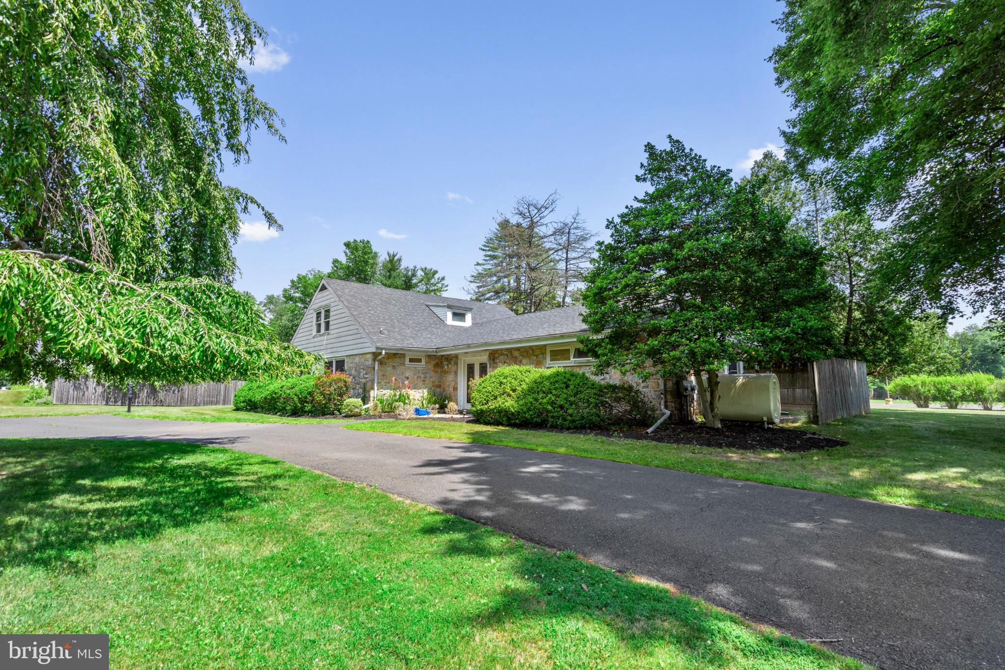 1457 Meetinghouse Road Warminster, PA 18974 - Photo 2 of 30 Charming home nestled in lush greenery.