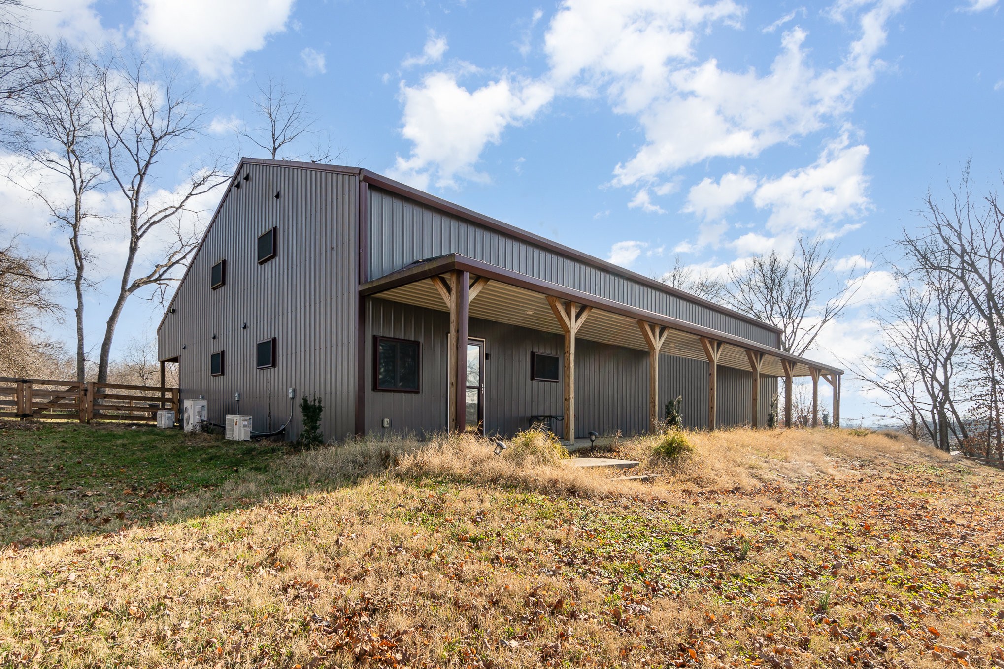 6960 Highway 231 Bethpage, TN 37022 - Photo 1 of 32 a front view of a house with a yard