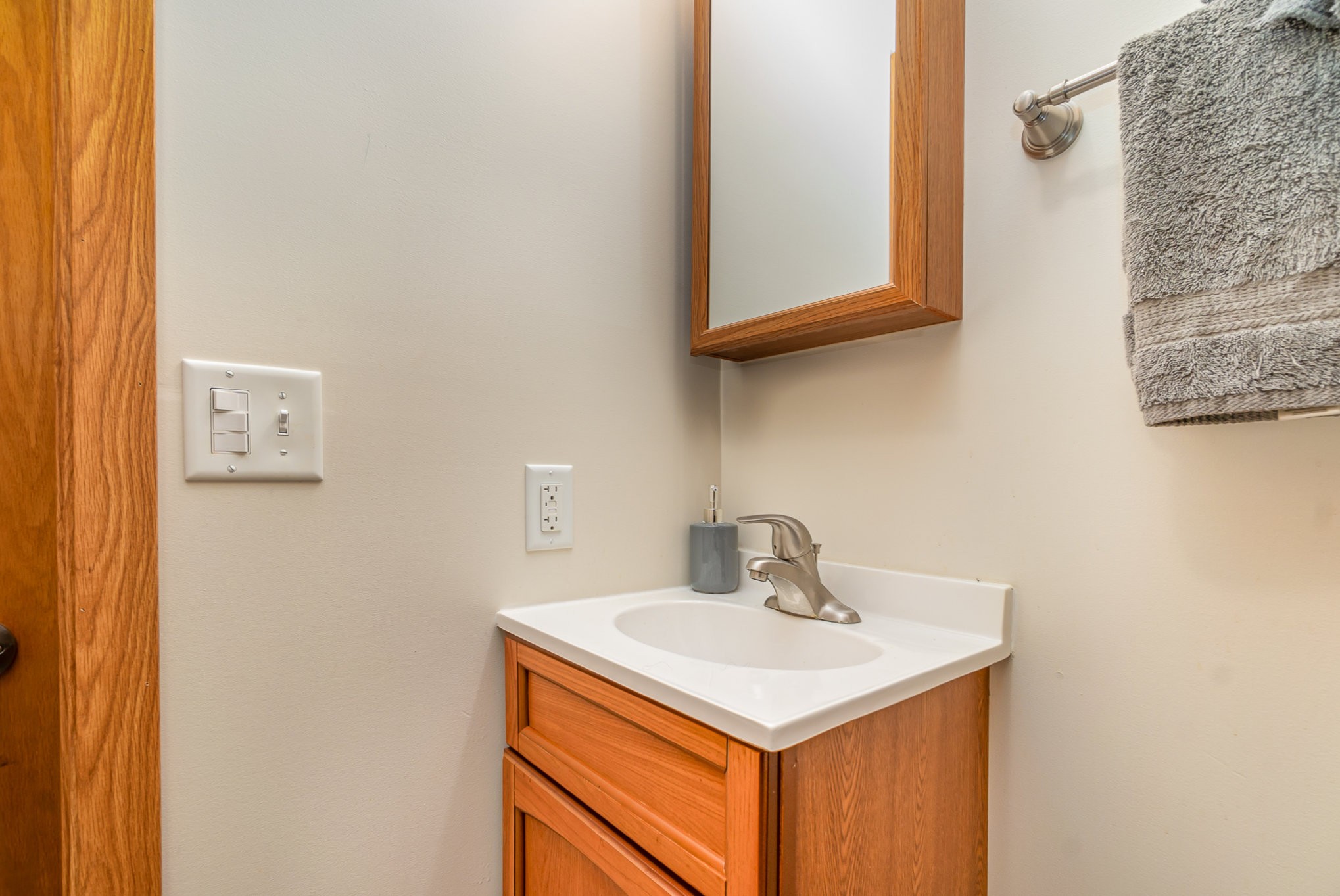 6960 Highway 231 Bethpage, TN 37022 - Photo 11 of 32 a bathroom with a sink and a mirror