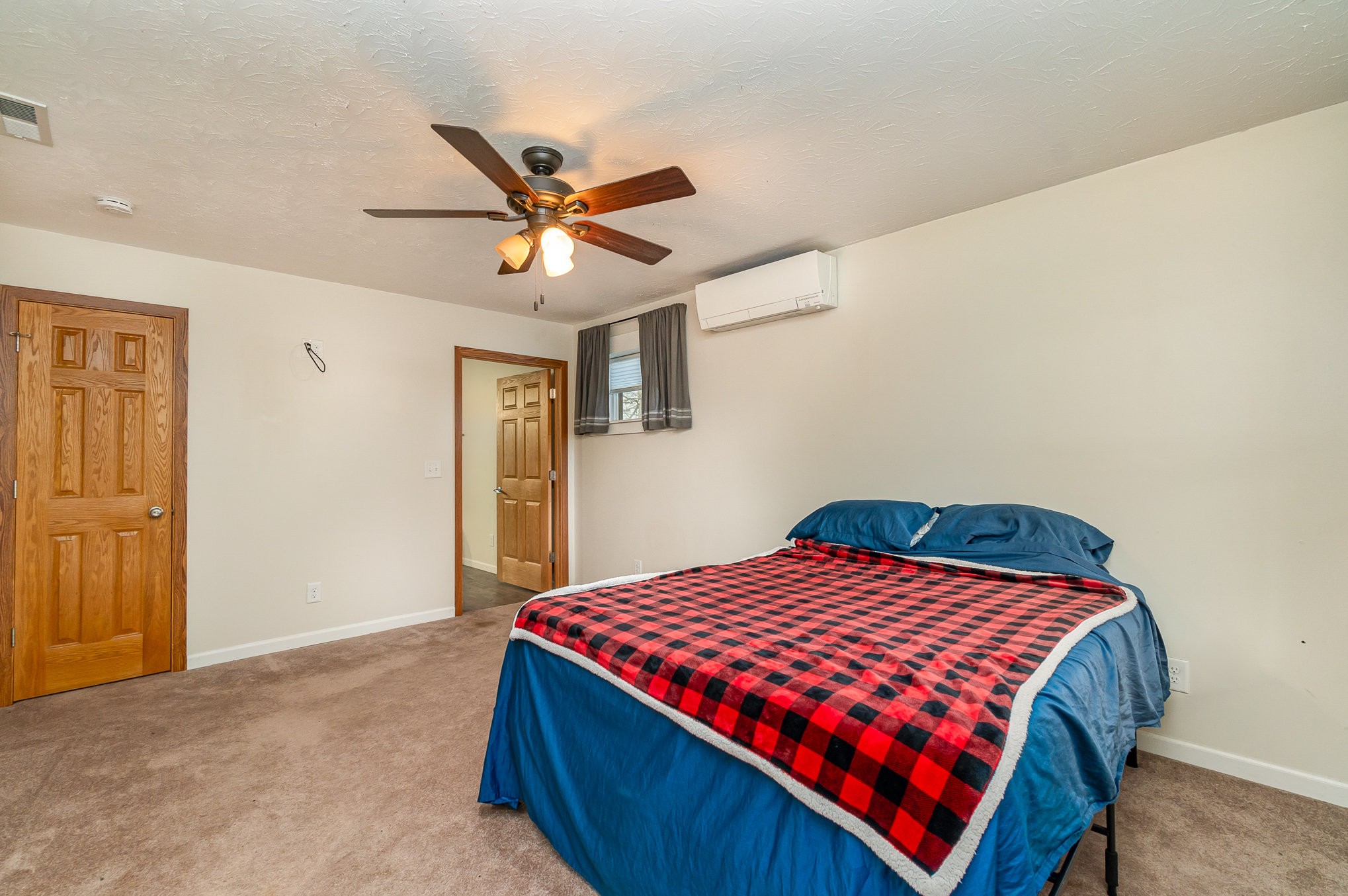 6960 Highway 231 Bethpage, TN 37022 - Photo 17 of 32 a bedroom with a bed and a dresser
