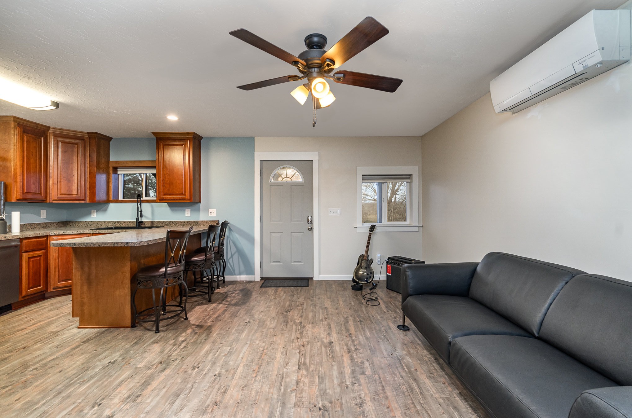 6960 Highway 231 Bethpage, TN 37022 - Photo 6 of 32 a living room with furniture and wooden floor