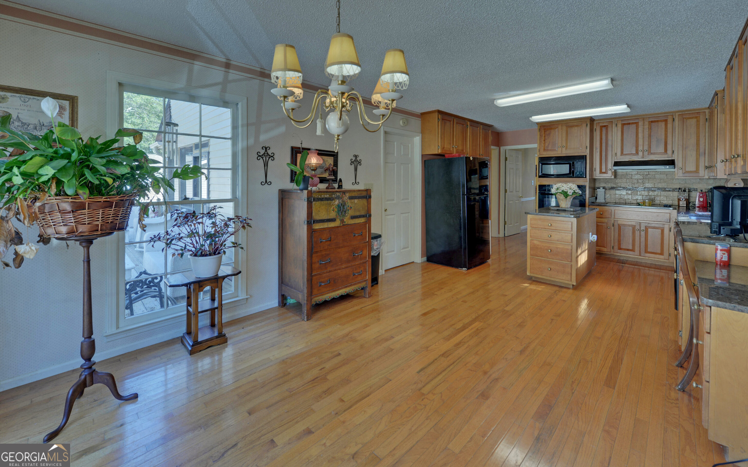 43 Pauline Avenue Toccoa, GA 30577 - Photo 13 of 40 a living room with furniture dining room and wooden floor