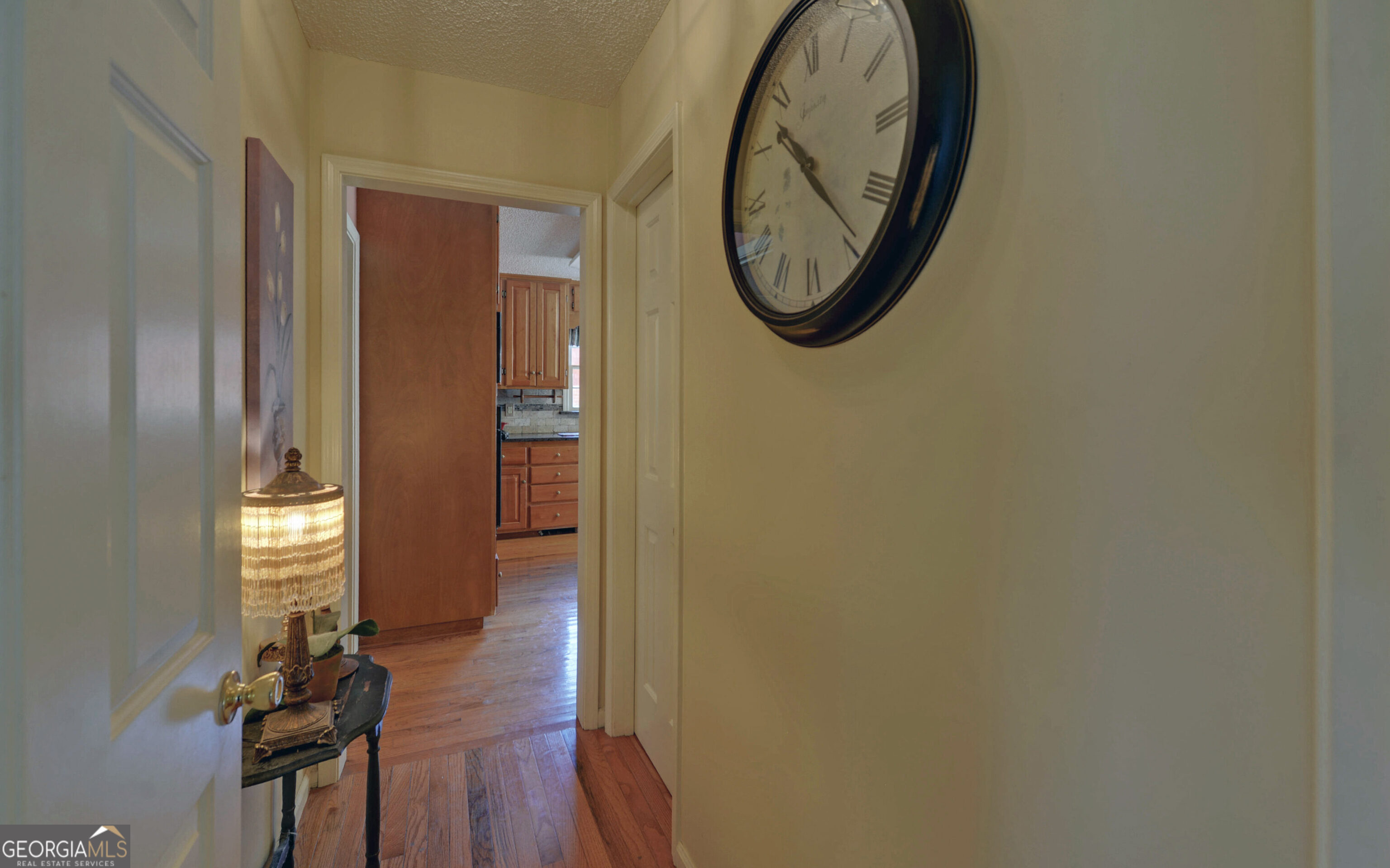 43 Pauline Avenue Toccoa, GA 30577 - Photo 15 of 40 a view of a hallway with wooden floor and a mirror