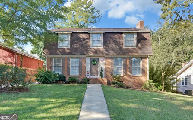 front view of house with a yard