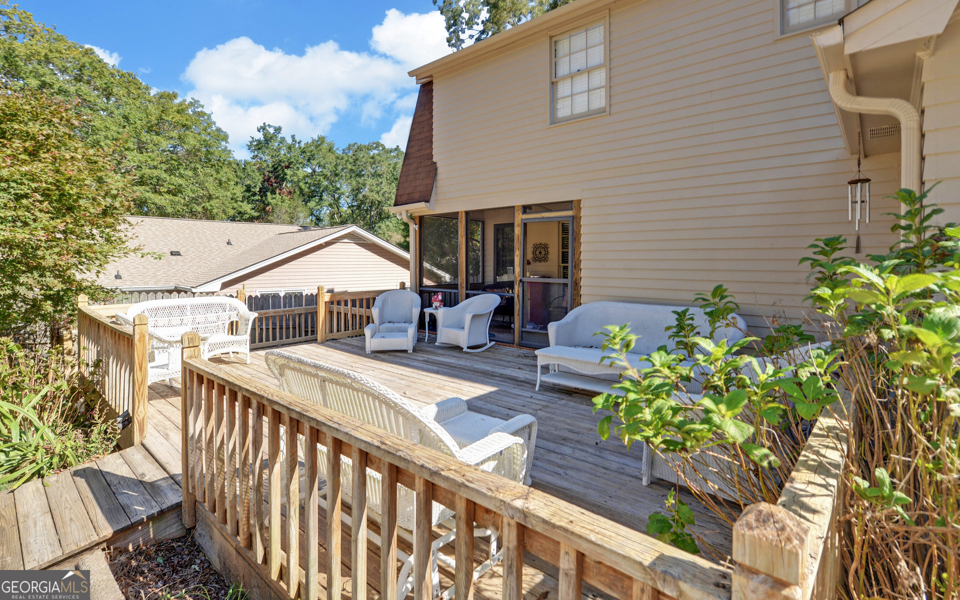43 Pauline Avenue Toccoa, GA 30577 - Photo 32 of 40 a view of a house with patio and wooden fence