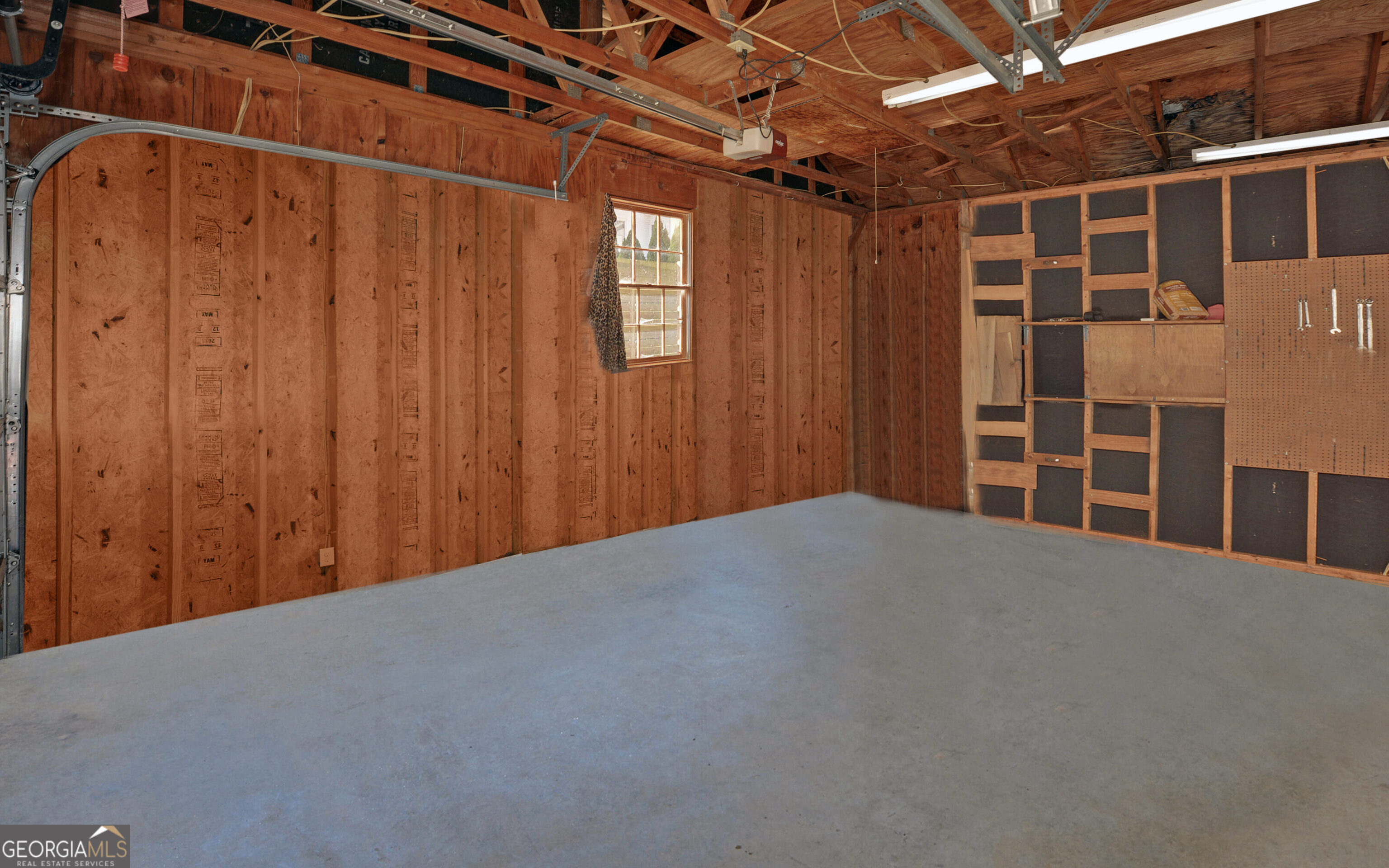 43 Pauline Avenue Toccoa, GA 30577 - Photo 38 of 40 a view of an empty room with wooden walls