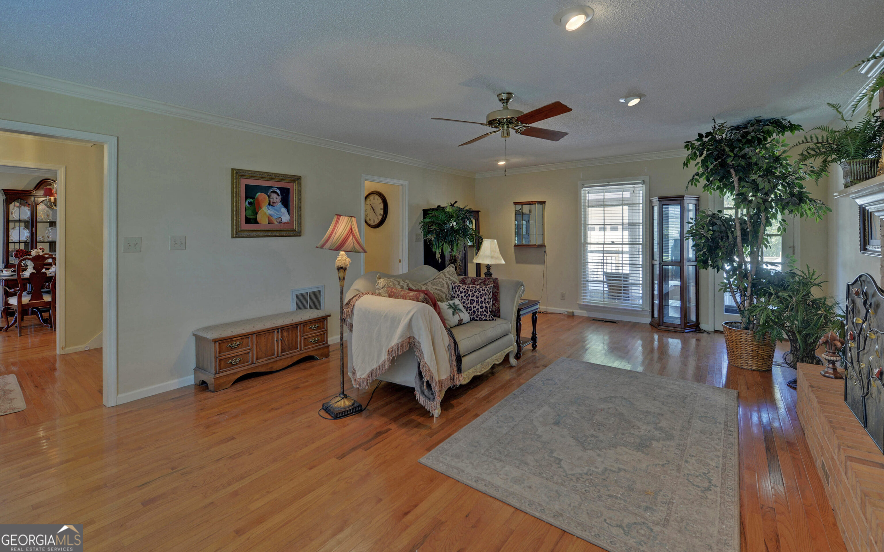 43 Pauline Avenue Toccoa, GA 30577 - Photo 7 of 40 a spacious bedroom with a bed and a potted plant