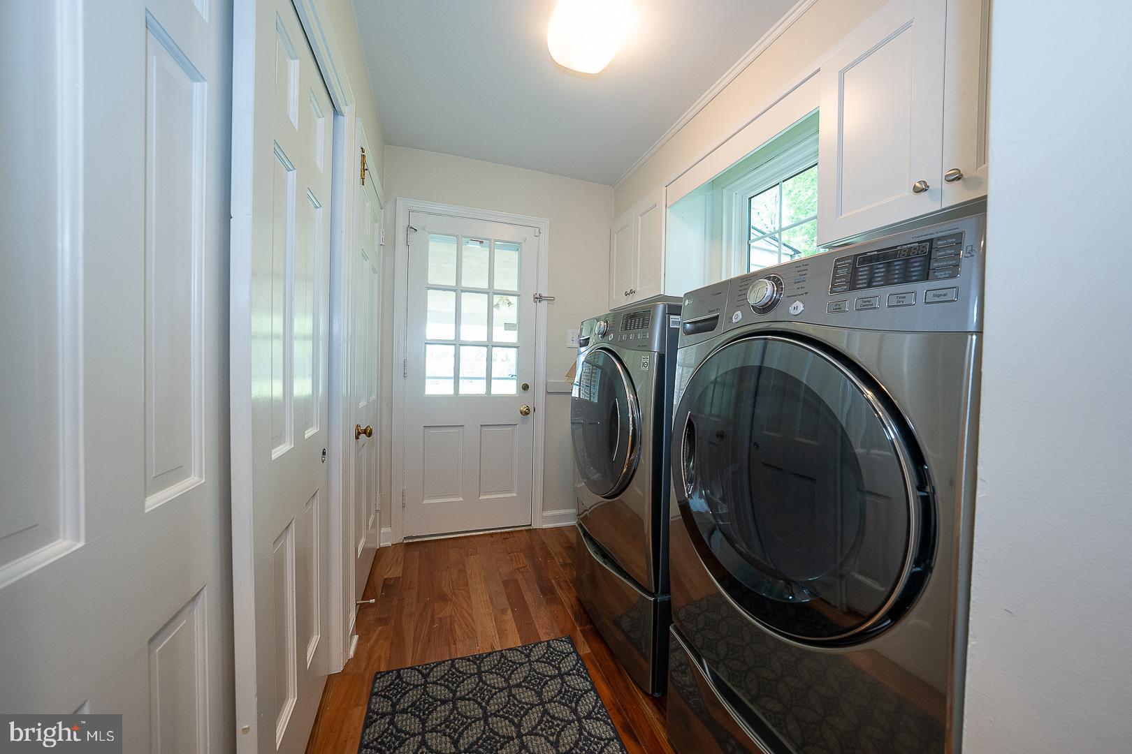 538 Conestoga Road Villanova, PA 19085 - Photo 13 of 39 a utility room with dryer and washer
