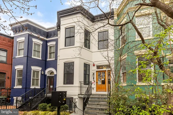 a front view of a multi story residential apartment building