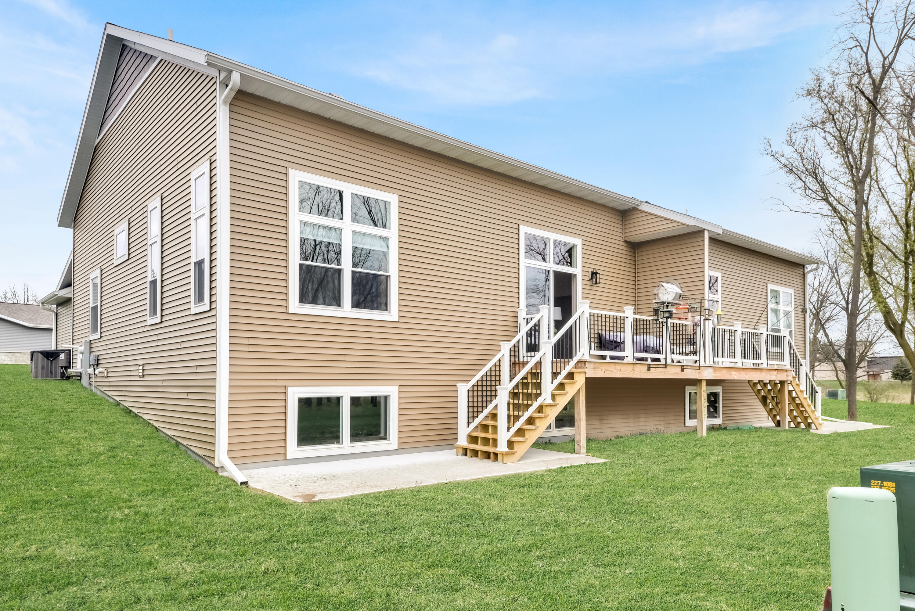 211 Edenview Lane Eden, WI 53019 - Photo 13 of 14 Deck and southern exposure
