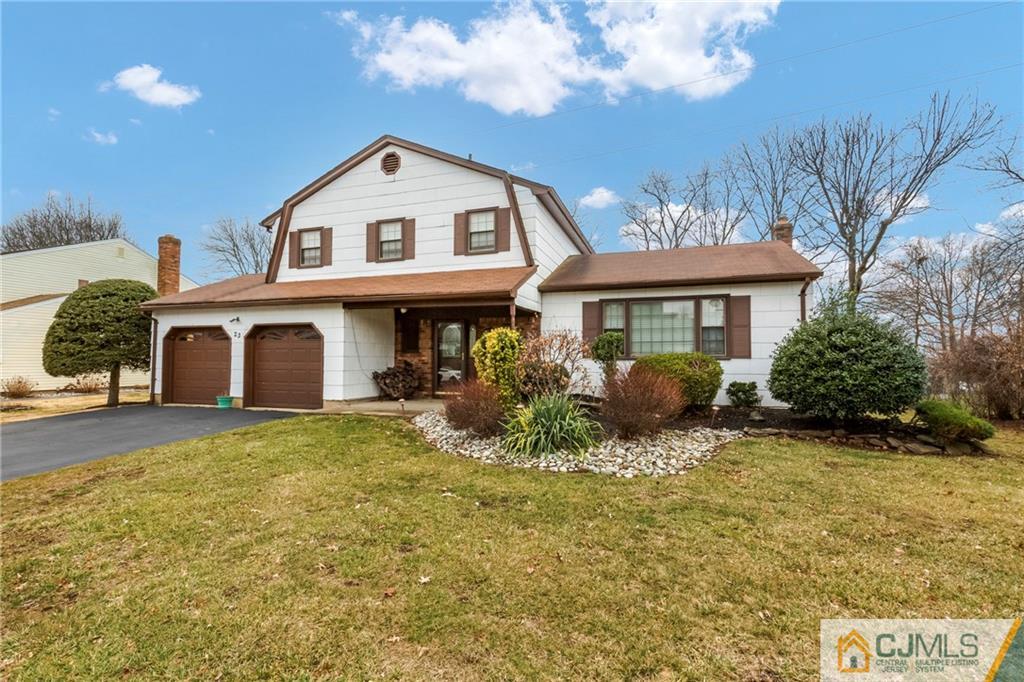 23 Roxy Avenue Edison, NJ 08820 - Photo 24 of 24 a front view of a house with a yard