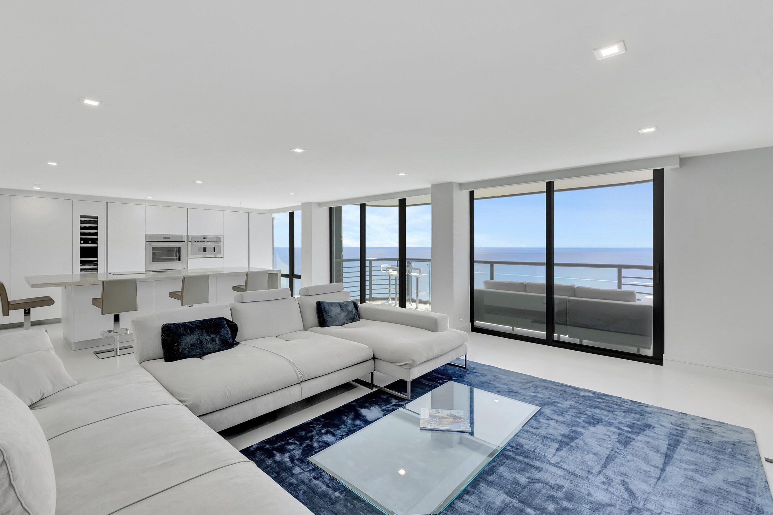 250 South Ocean Boulevard, Unit 16G Boca Raton, FL 33432 - Photo 21 of 91 a living room with furniture and a rug