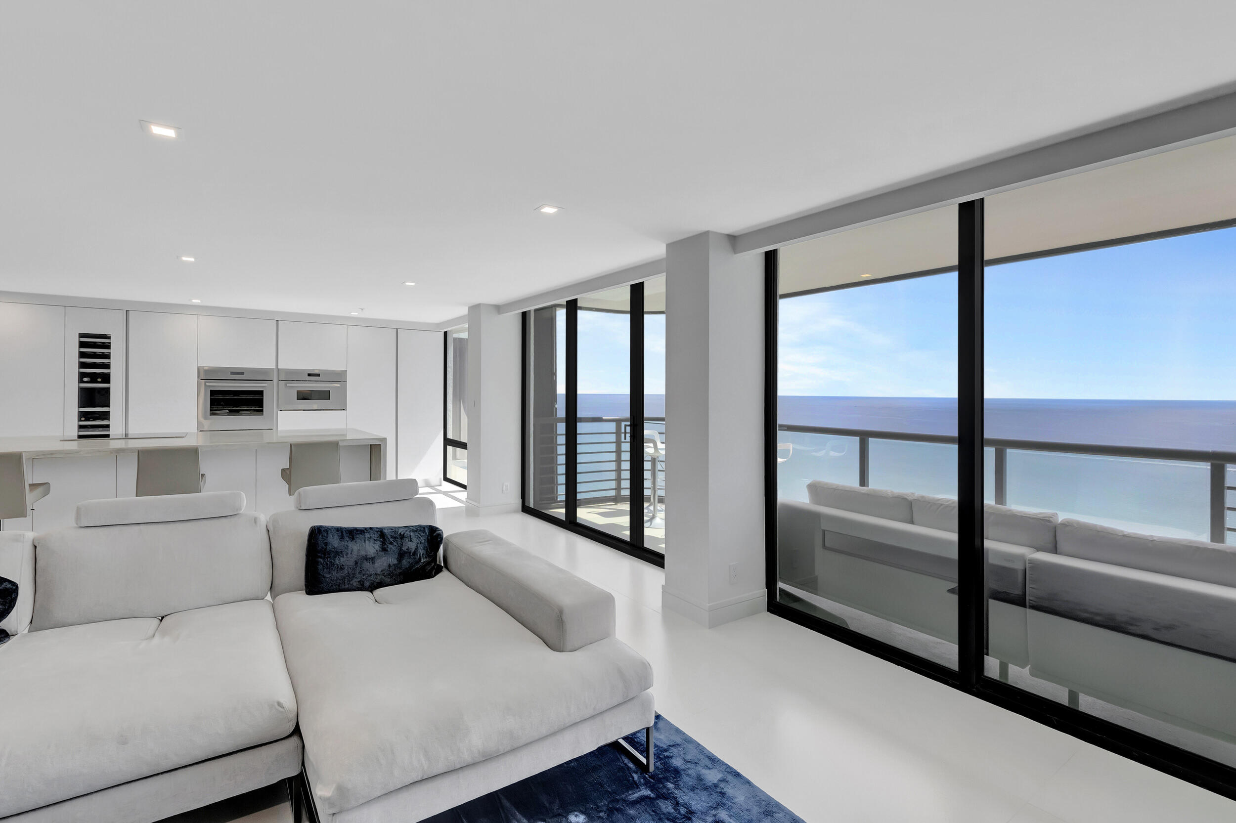 250 South Ocean Boulevard, Unit 16G Boca Raton, FL 33432 - Photo 22 of 91 a living room with furniture and a large window