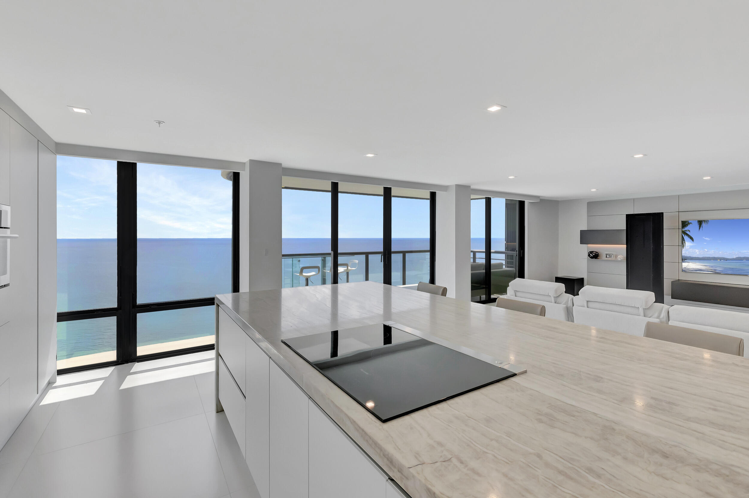 250 South Ocean Boulevard, Unit 16G Boca Raton, FL 33432 - Photo 31 of 91 a living room with stainless steel appliances kitchen island granite countertop a sink and cabinets