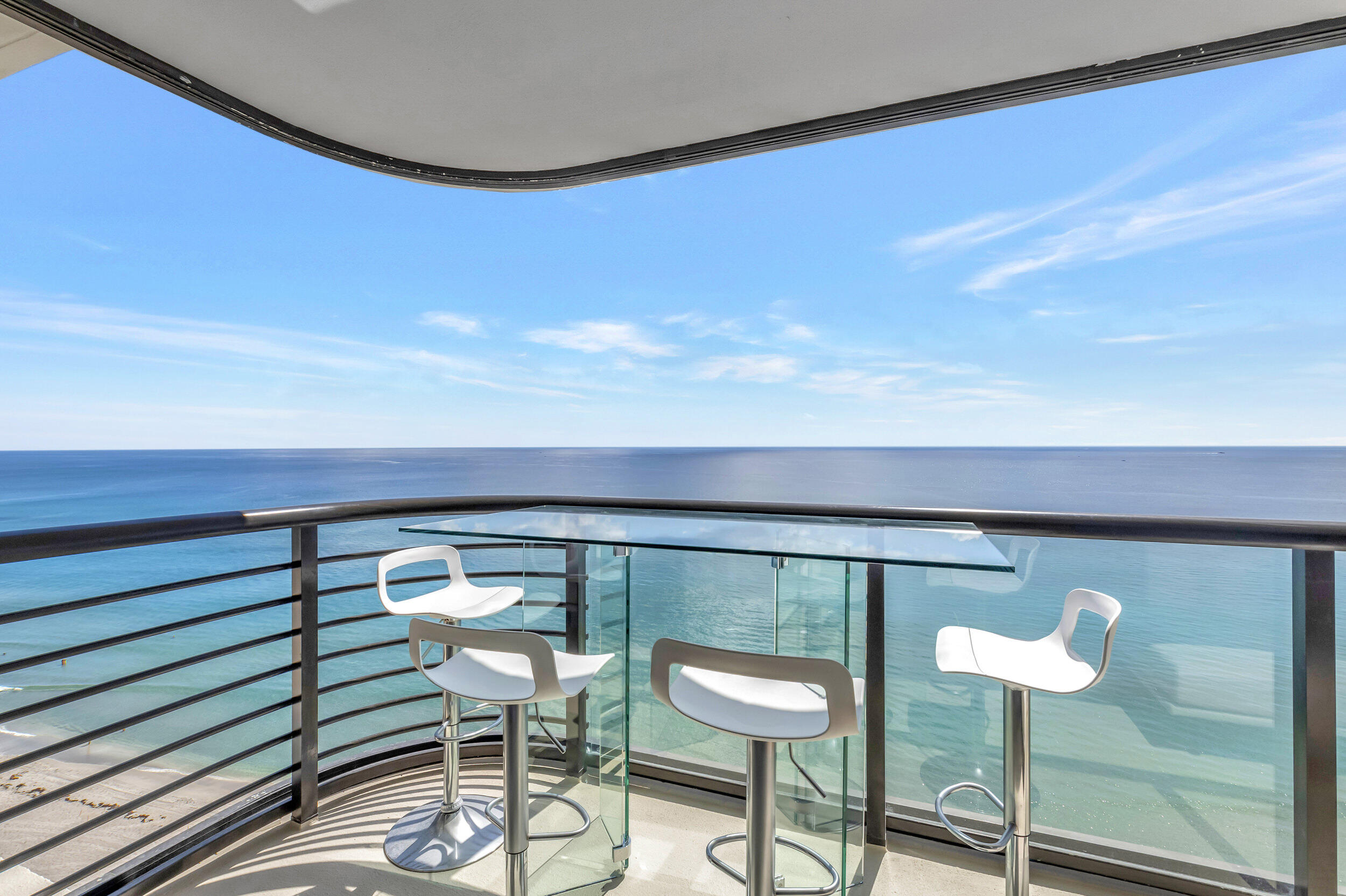 250 South Ocean Boulevard, Unit 16G Boca Raton, FL 33432 - Photo 32 of 91 a view of a chairs and table in a balcony