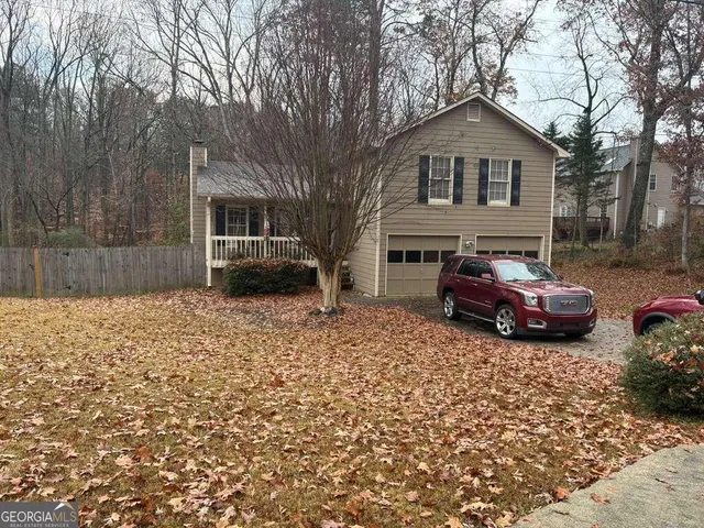 a car parked in front of a house