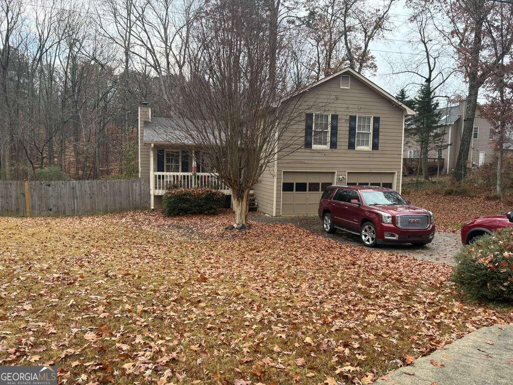 a car parked in front of a house