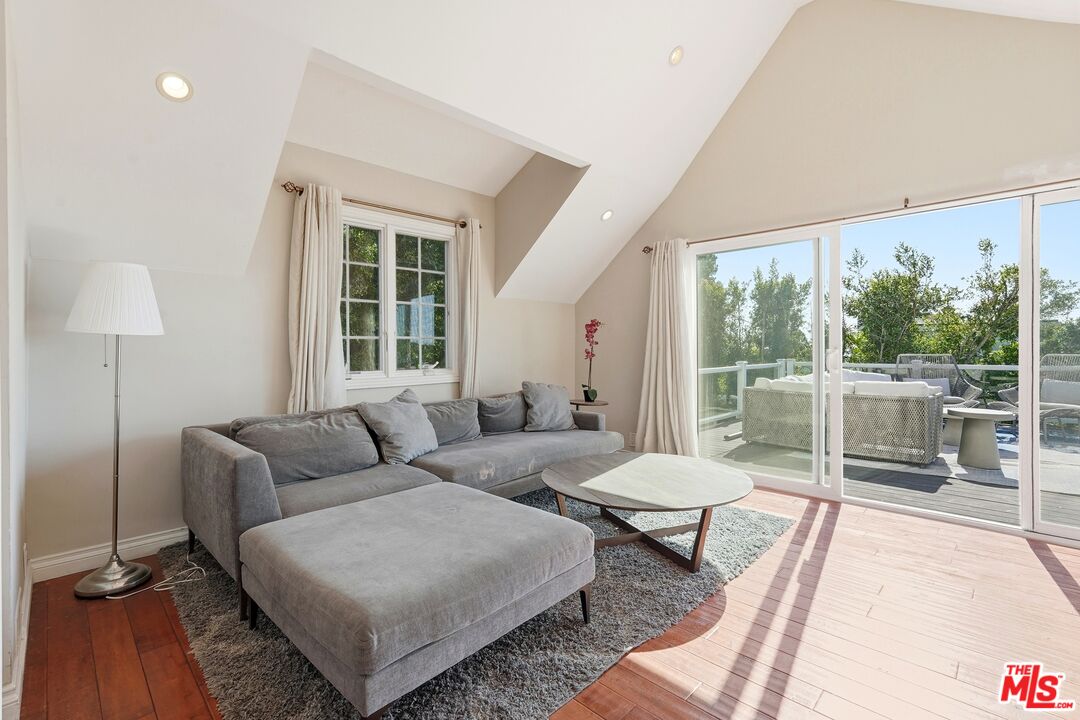 2955 Corral Canyon Road Malibu, CA 90265 - Photo 13 of 21 a living room with furniture and a large window