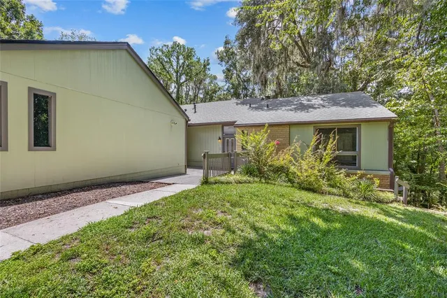 a view of a house with a garden