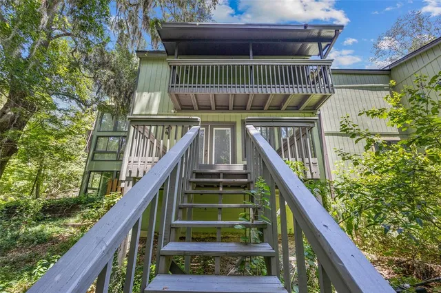 a view of stairs and flowers