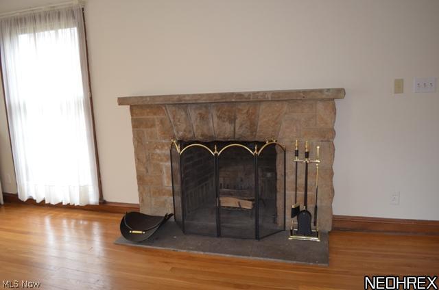 Stone firepalce in living room.