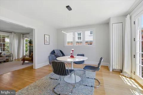 a room with furniture and wooden floor