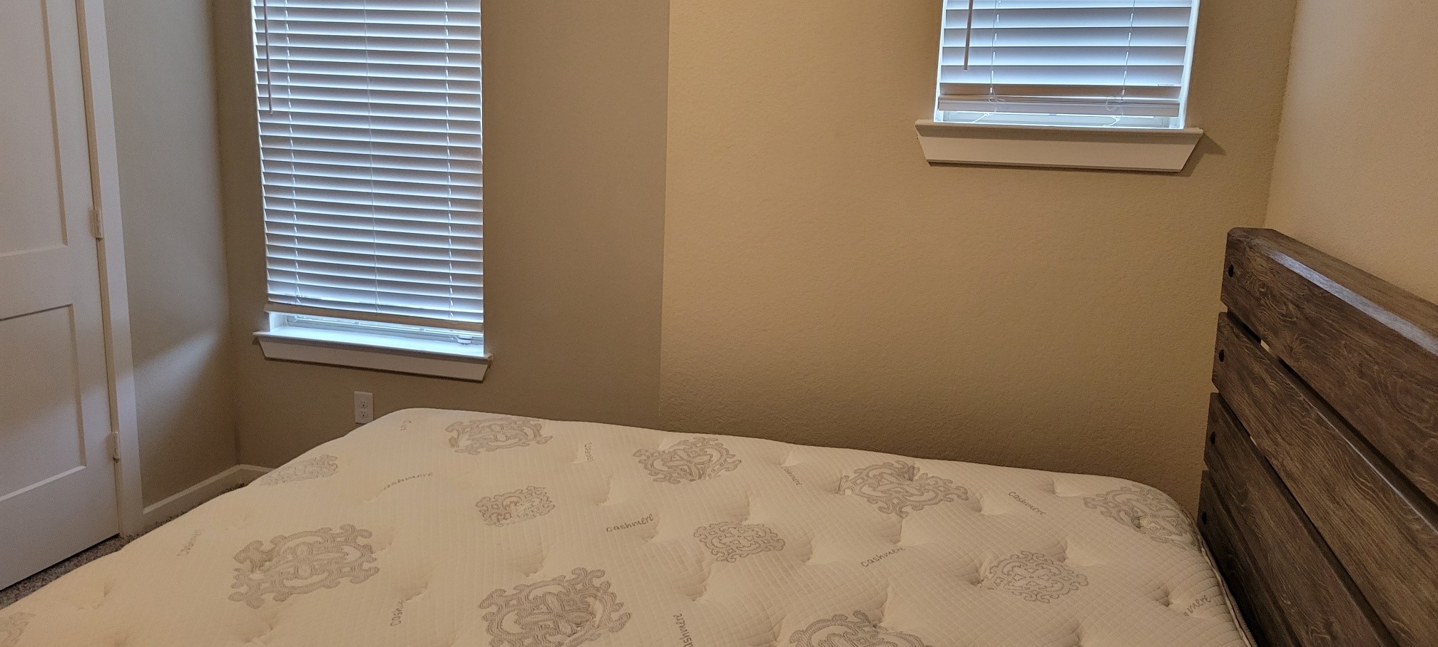 405 Rise Lane Montgomery, TX 77316 - Photo 14 of 17 a bedroom with a bed and a window