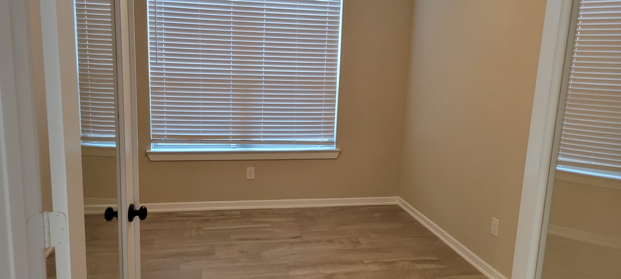 405 Rise Lane Montgomery, TX 77316 - Photo 7 of 17 a view of a room that has a window in it