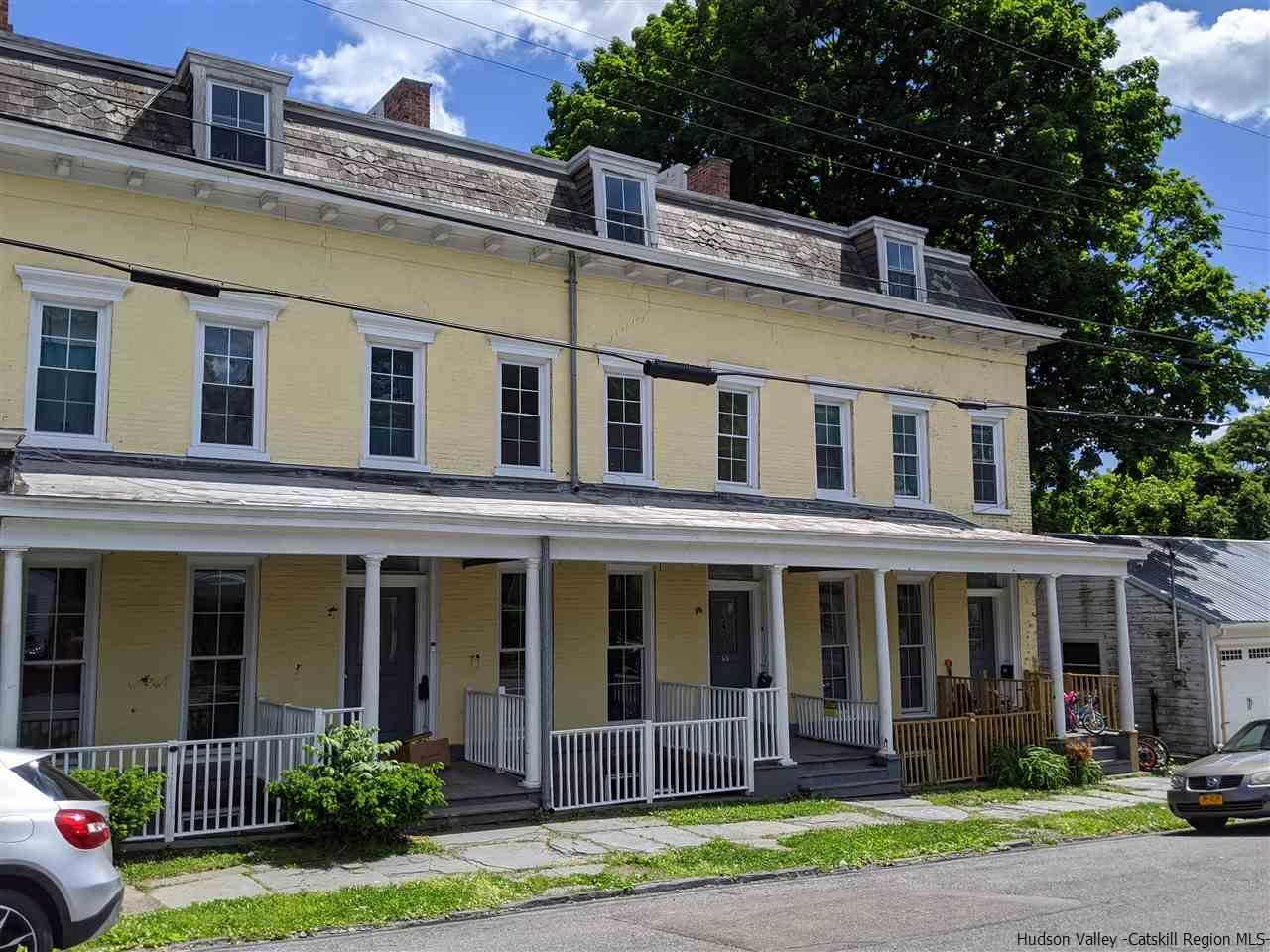 78-88 Spring Street Kingston, NY 12401 - Photo 1 of 34 front view of a house with a yard