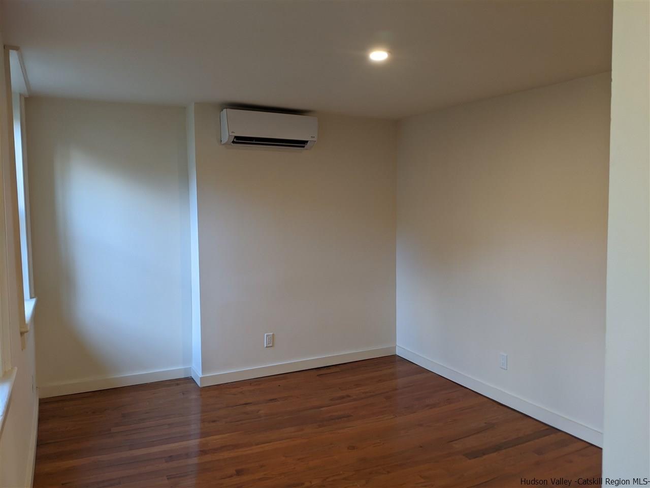 78-88 Spring Street Kingston, NY 12401 - Photo 12 of 34 a view of an empty room with wooden floor