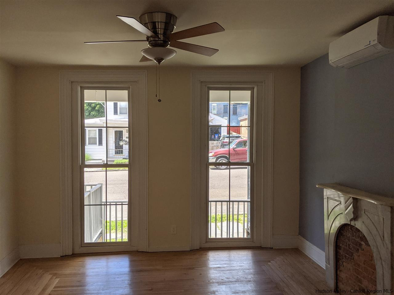 78-88 Spring Street Kingston, NY 12401 - Photo 20 of 34 a view of empty room with wooden floor and fan