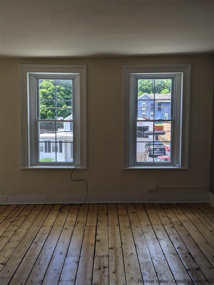 78-88 Spring Street Kingston, NY 12401 - Photo 21 of 34 a view of empty room with wooden floor