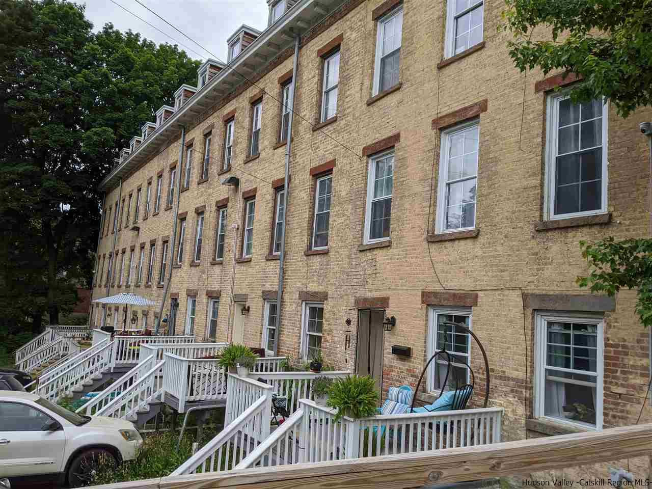 78-88 Spring Street Kingston, NY 12401 - Photo 5 of 34 a view of a building and car parked