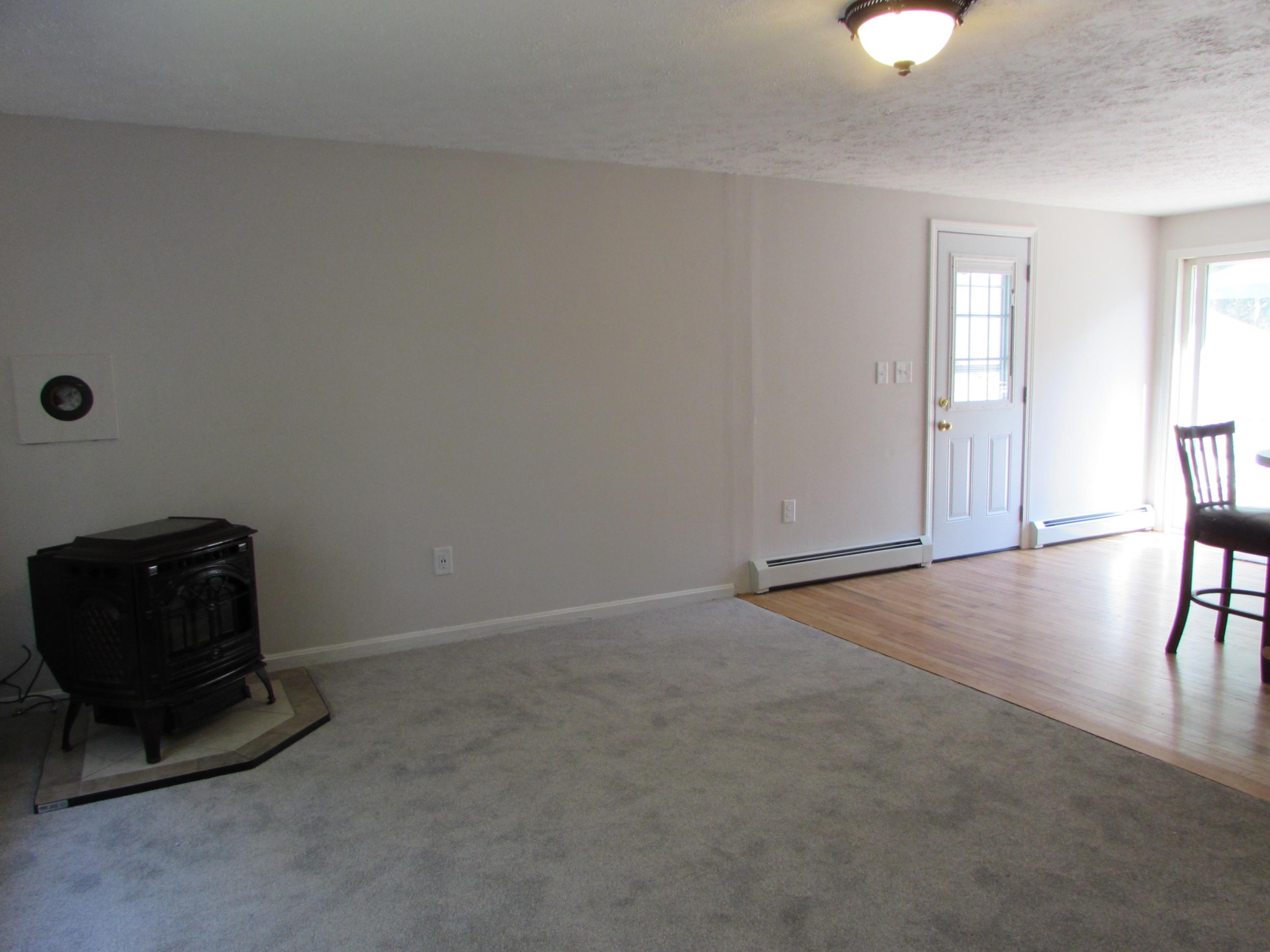990 Quarry Road Wells, ME 04090 - Photo 22 of 37 Living room looking toward Dining area