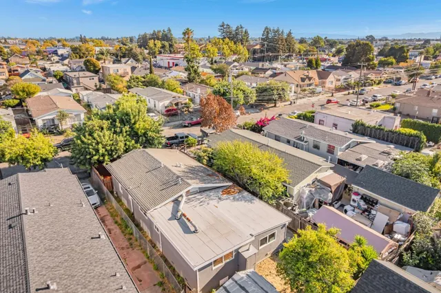 an aerial view of residential house with outdoor space