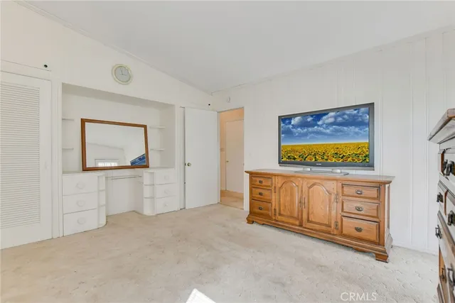 a view of a livingroom with furniture and windows