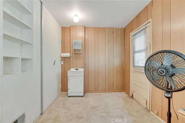 a view of a bathroom from a hallway