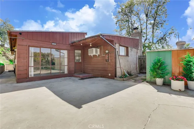 an aerial view of house with yard