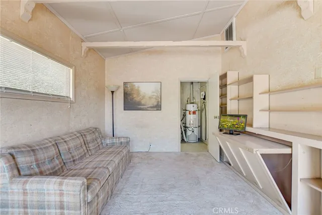 a living room with furniture and a couch