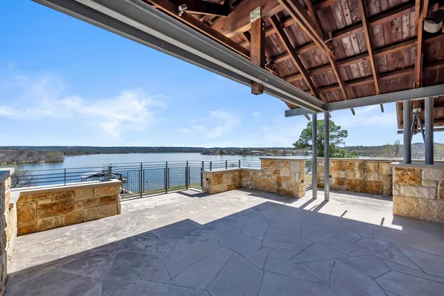 a view of swimming pool with outdoor seating