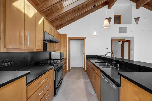 a view of an entryway with a roof