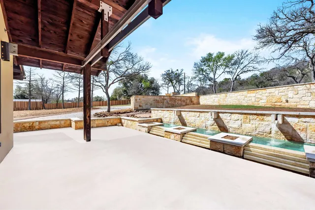 an aerial view of a house with a garden
