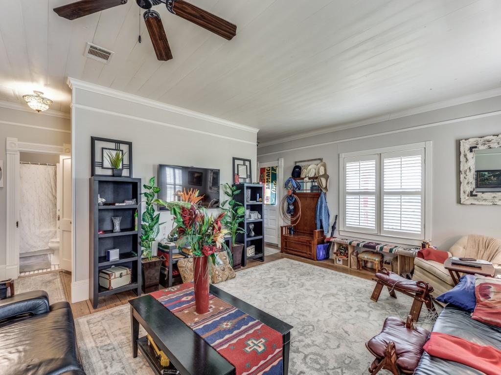 392 Mt Pleasant Road Valley View, TX 76272 - Photo 20 of 27 a living room with furniture and a flat screen tv