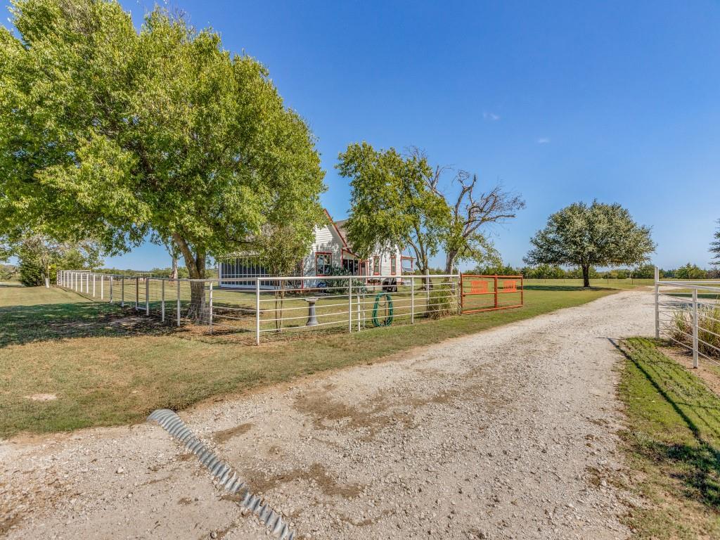 392 Mt Pleasant Road Valley View, TX 76272 - Photo 27 of 27 a view of swimming pool with a yard